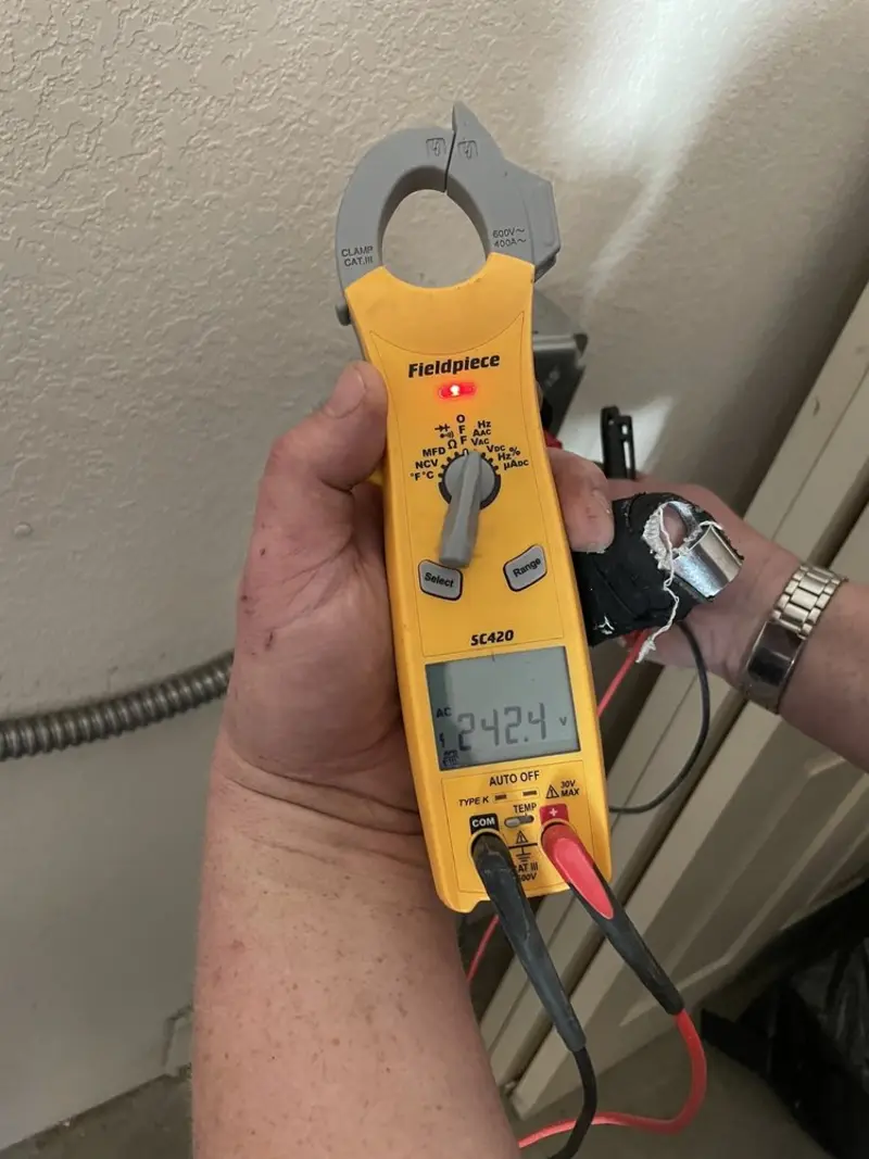 Voltage testing with clamp meter during Generator Installation in Slippery Rock